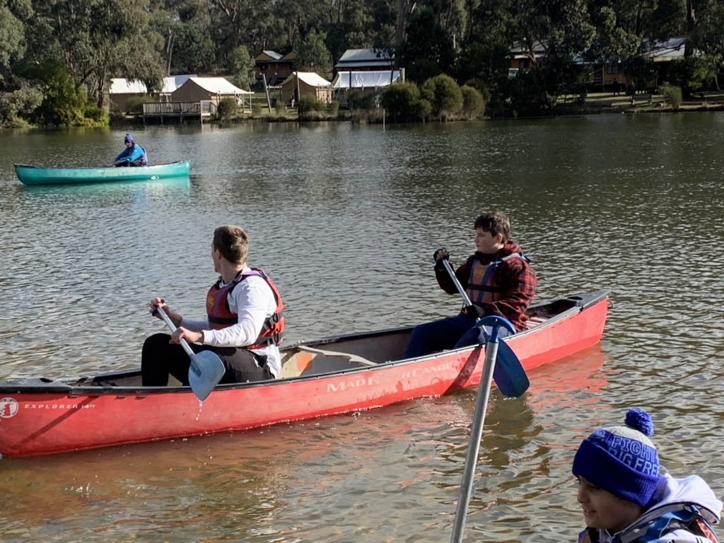 students-rafting-at-camp
